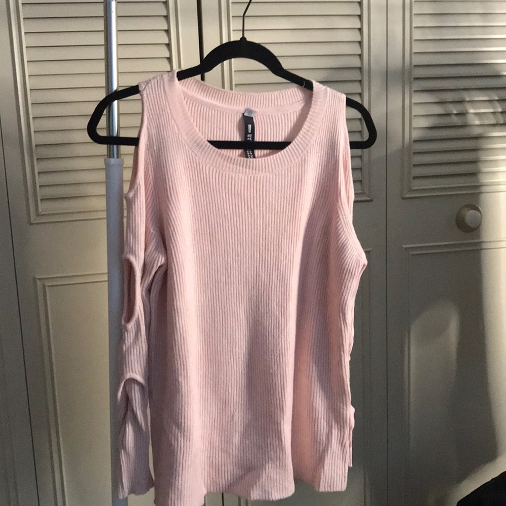Light pink women’s sweater top